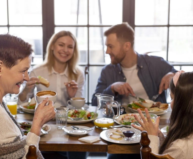 A happy family having diner at the restaurant